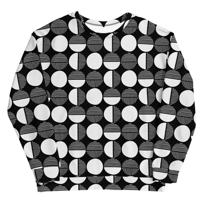 Geometric pattern sweatshirt with black base and white circles, crew neck, long sleeves.