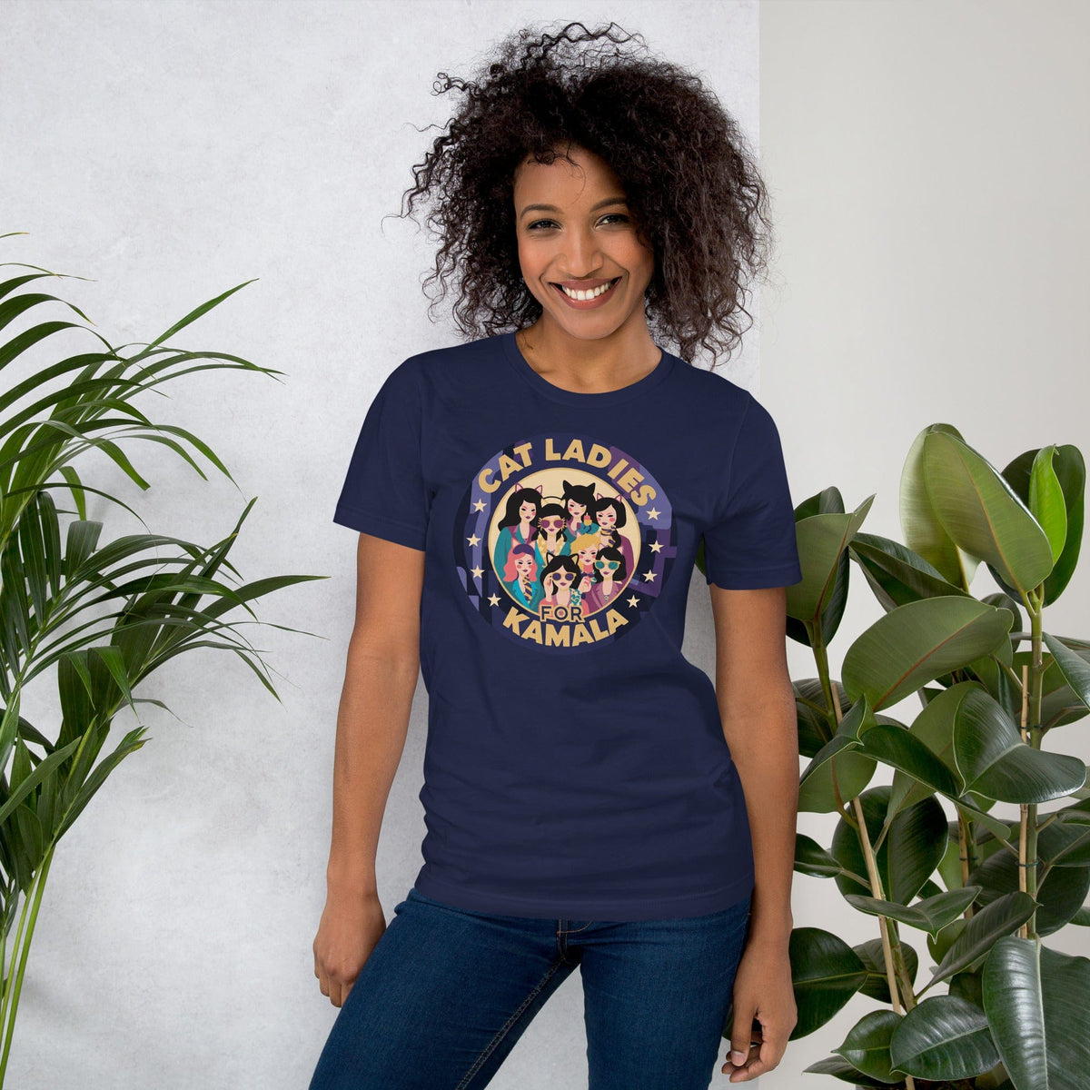 Navy T-shirt with “CAT LADIES FOR KAMALA” cat graphic in a round emblem
