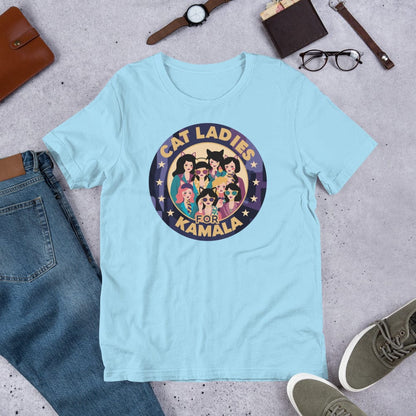 Light blue T-shirt with centered round “CAT LADIES FOR KAMALA” cat graphic