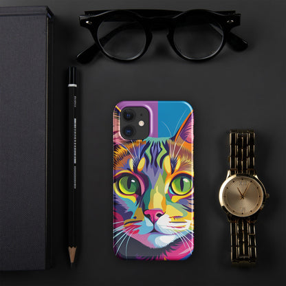 iPhone snap case showing a colorful cat face on a purple-and-blue background