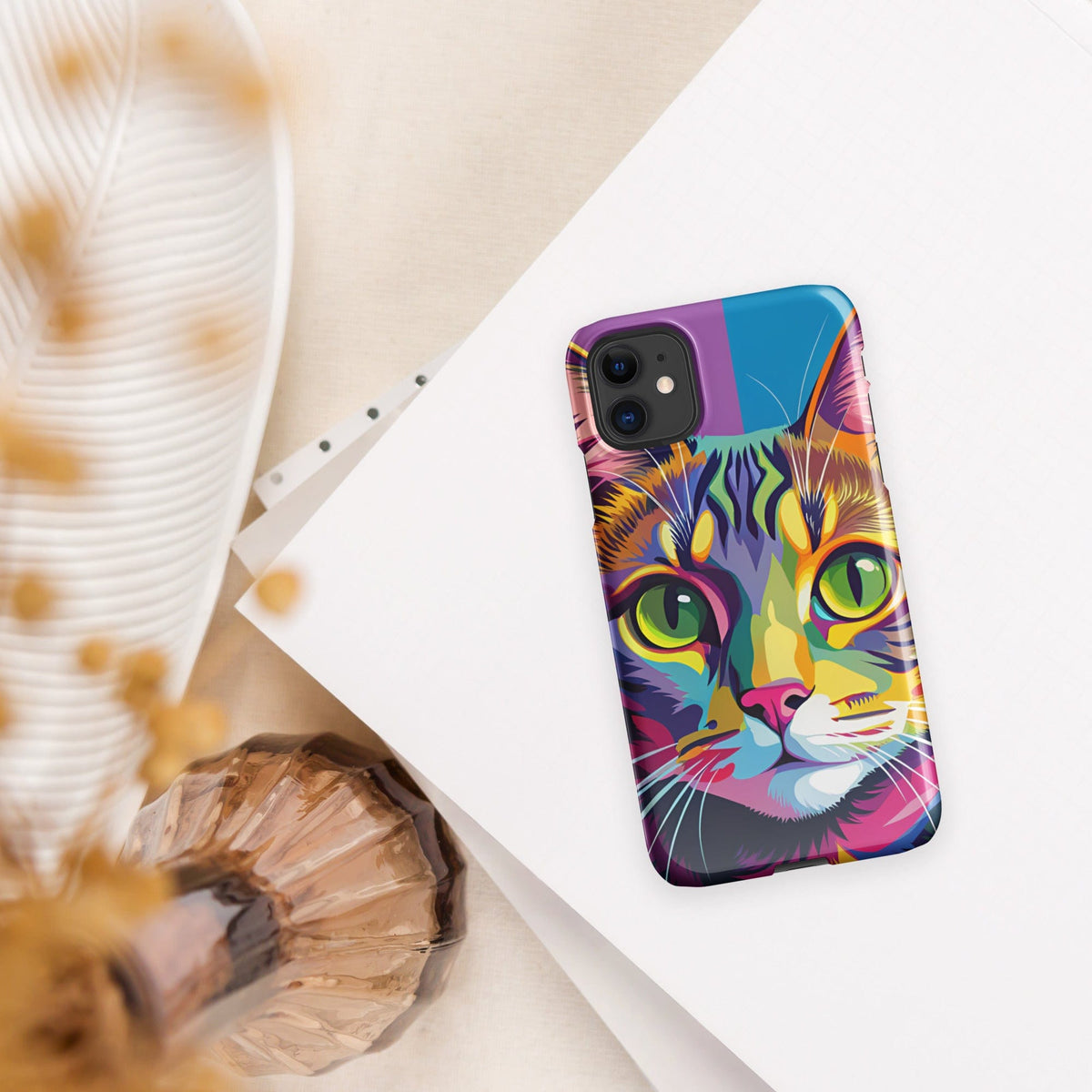 Cat iPhone snap case with colorful cat face artwork, slim profile