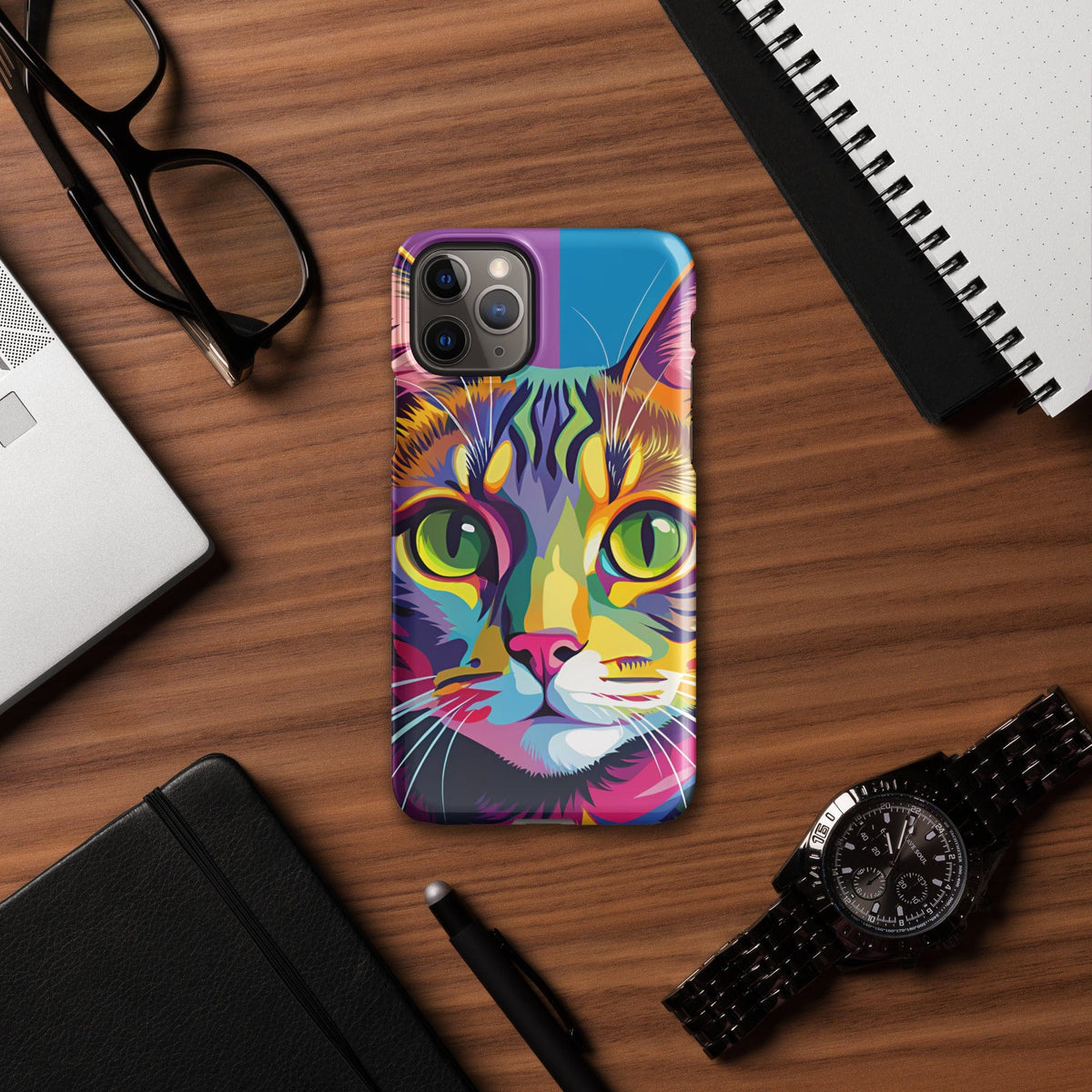 Cat iPhone snap case with colorful cat face artwork, top view with cameras