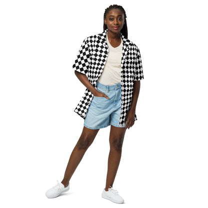 Unisex black-and-white chessboard button shirt over a light top, short sleeves.