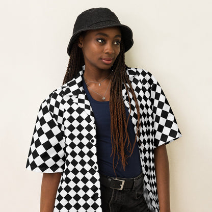 Unisex chessboard patterned button shirt with open collar and short sleeves, black/white.