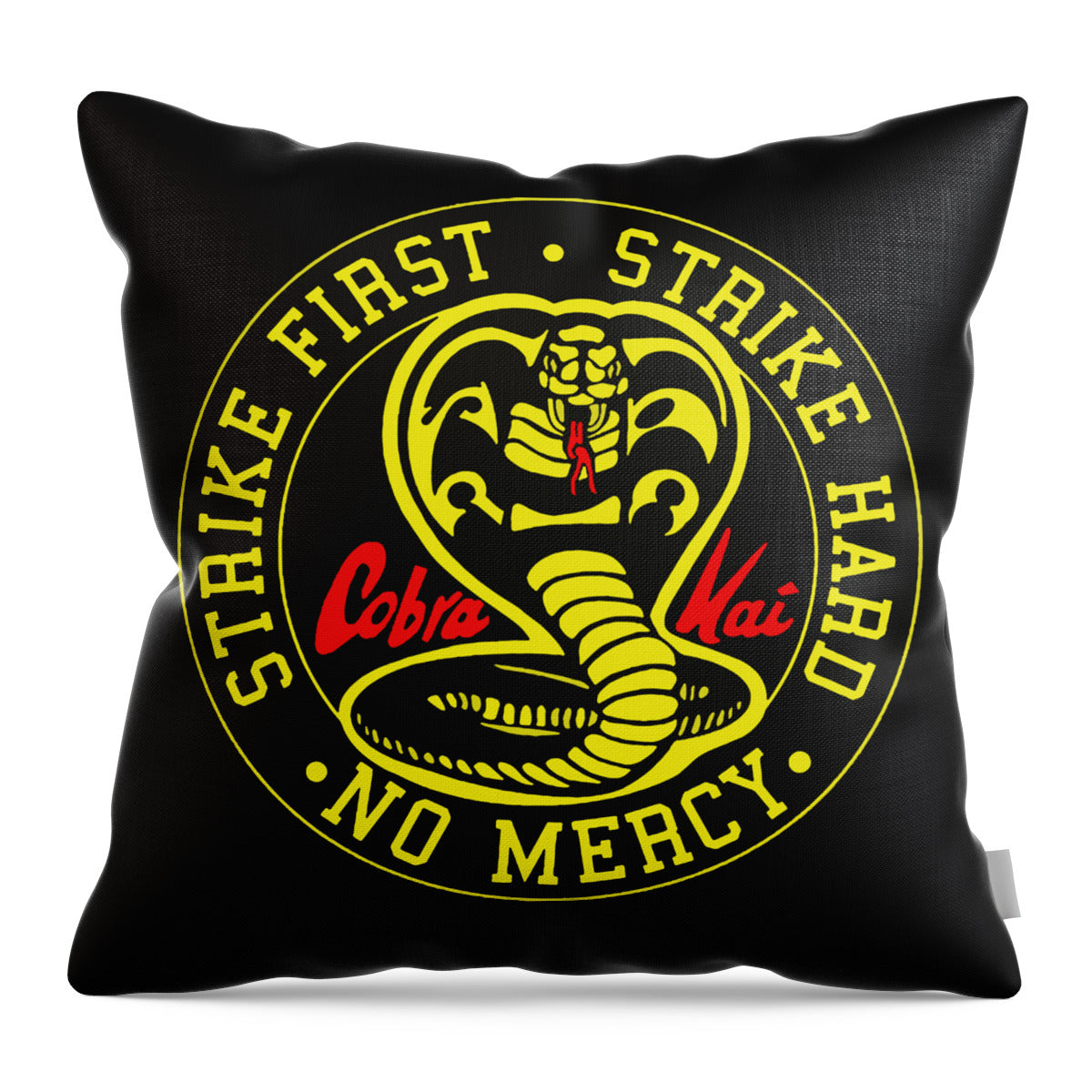 Black throw pillow with bold Cobra Kai Strike First emblem and colorful cobra