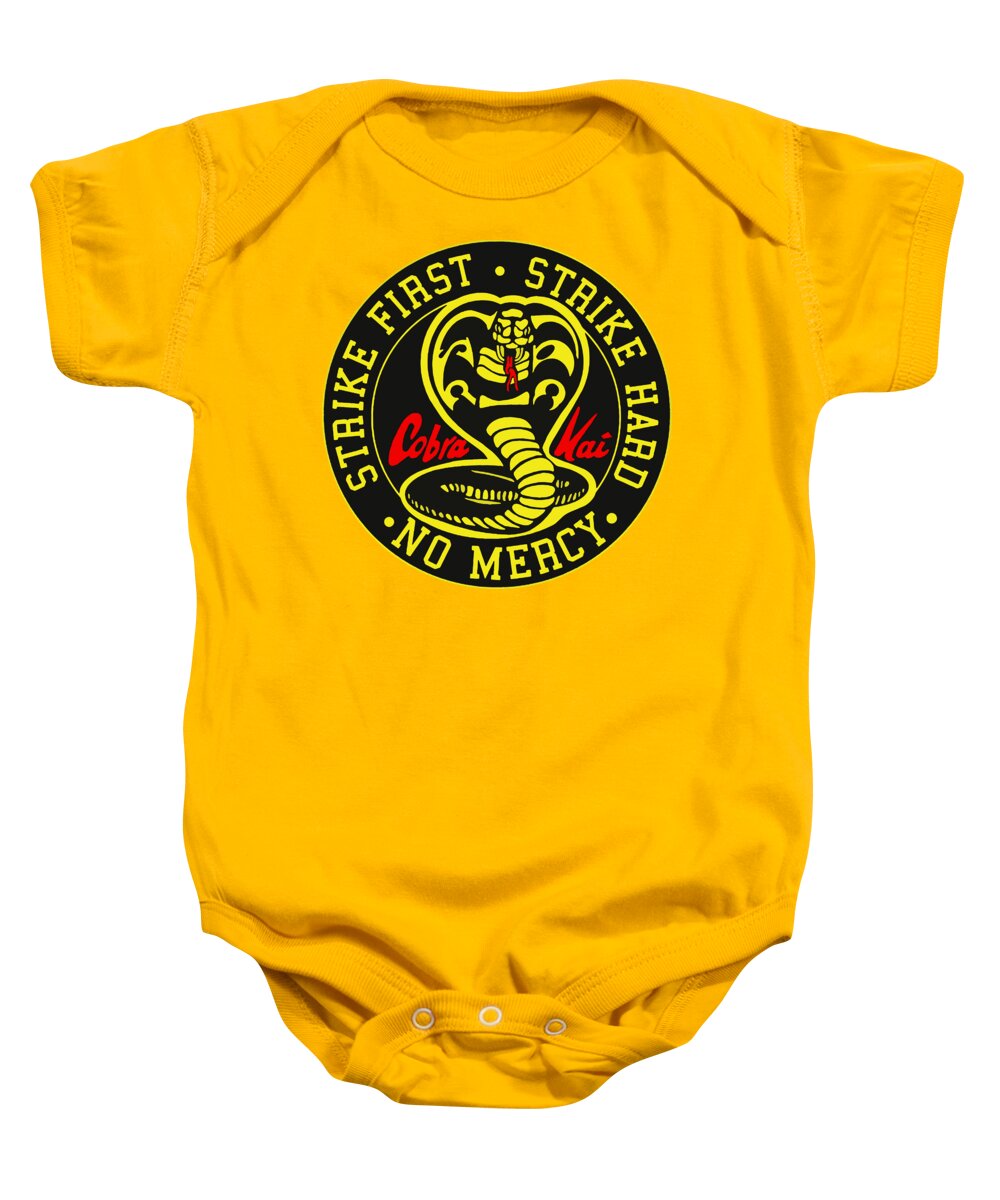 Yellow baby onesie with short sleeves, snap-button legs, and round karate logo graphic