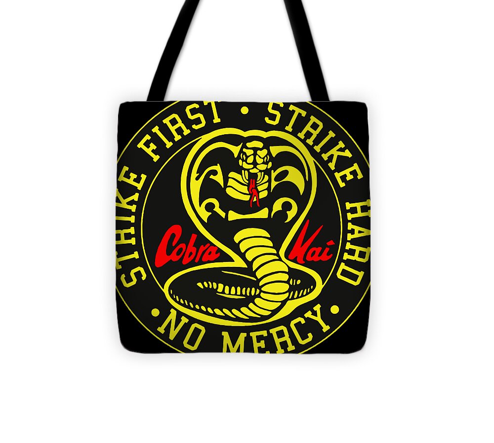 Black tote bag with large round cobra graphic and red accents; two black handles