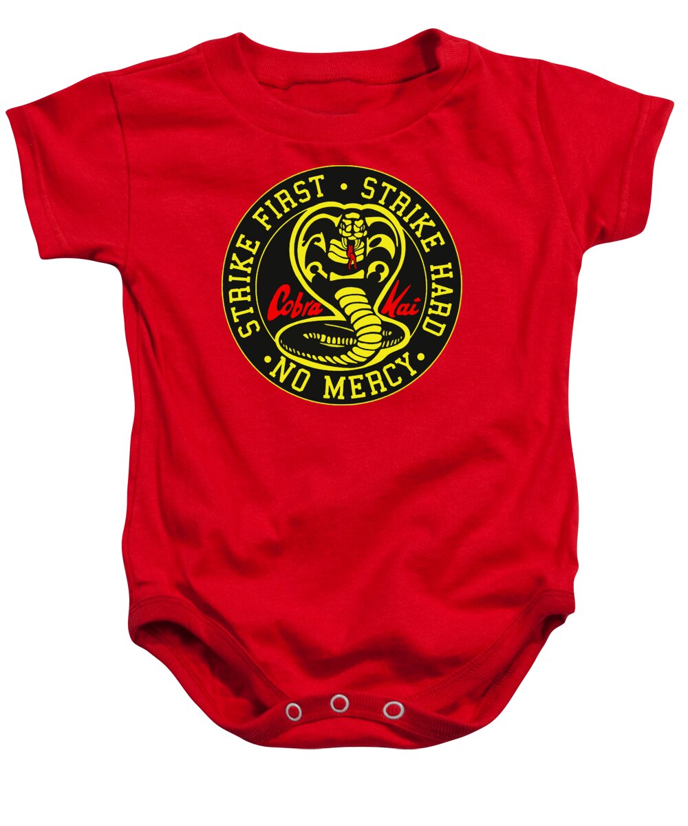Red baby onesie with short sleeves, snap-button legs, and round karate logo graphic