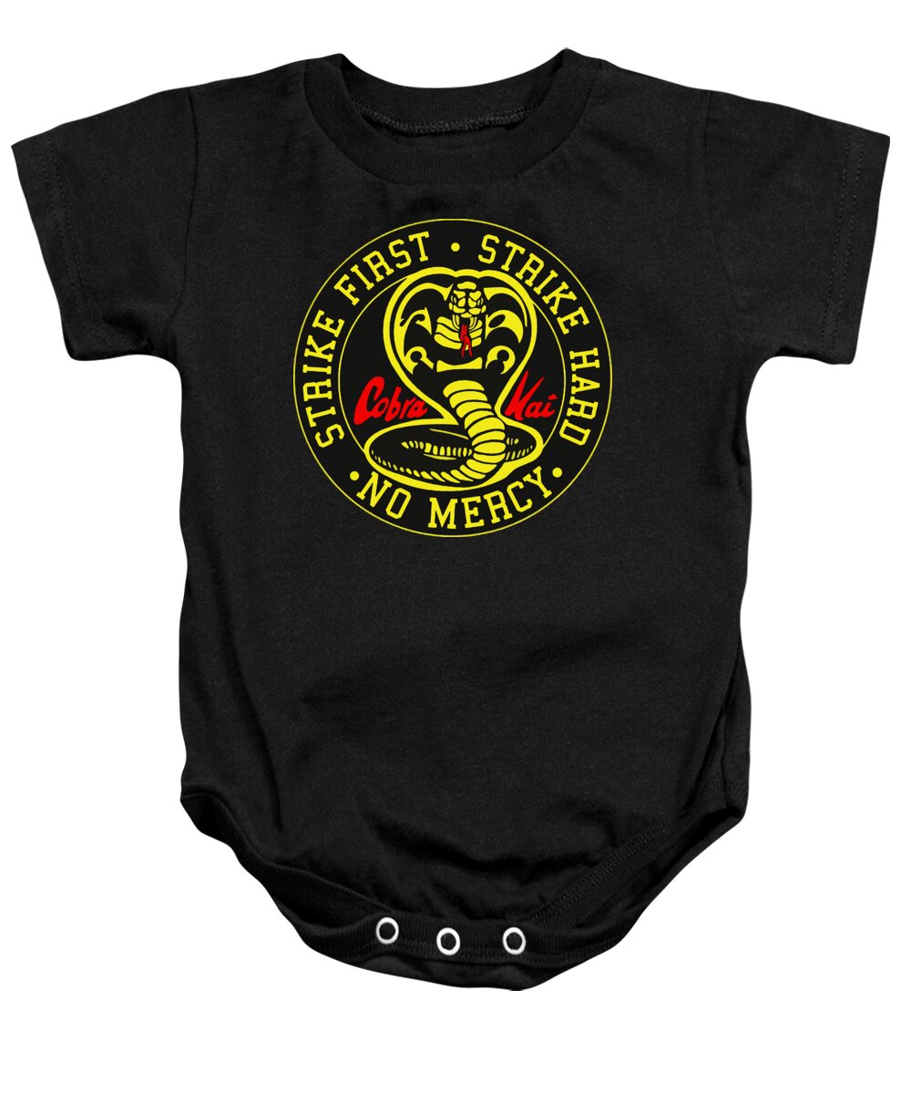 Black baby onesie with short sleeves, snap-button legs, and round karate logo graphic