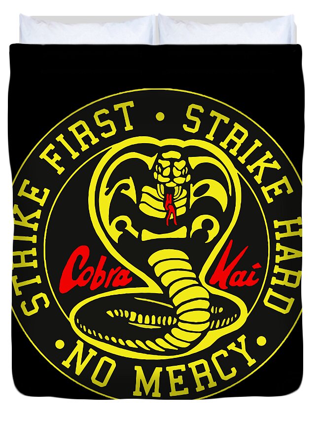 Black duvet cover with close-up Cobra Kai Strike First logo medallion and text.