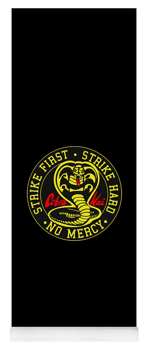 Black yoga mat with Cobra Kai circular logo and slogan near the bottom