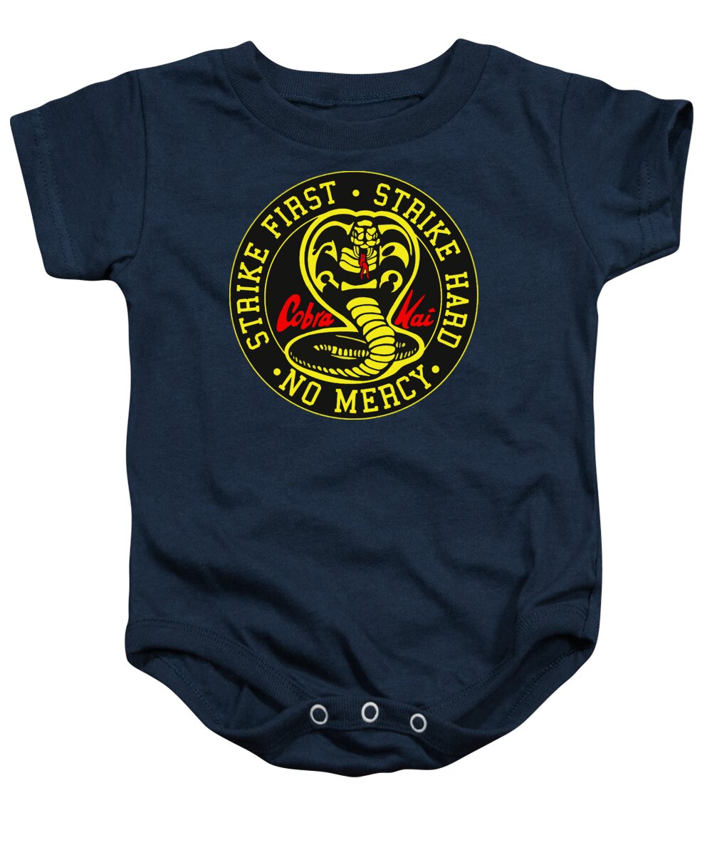Dark navy baby onesie with short sleeves, snap-button legs, and round karate logo graphic