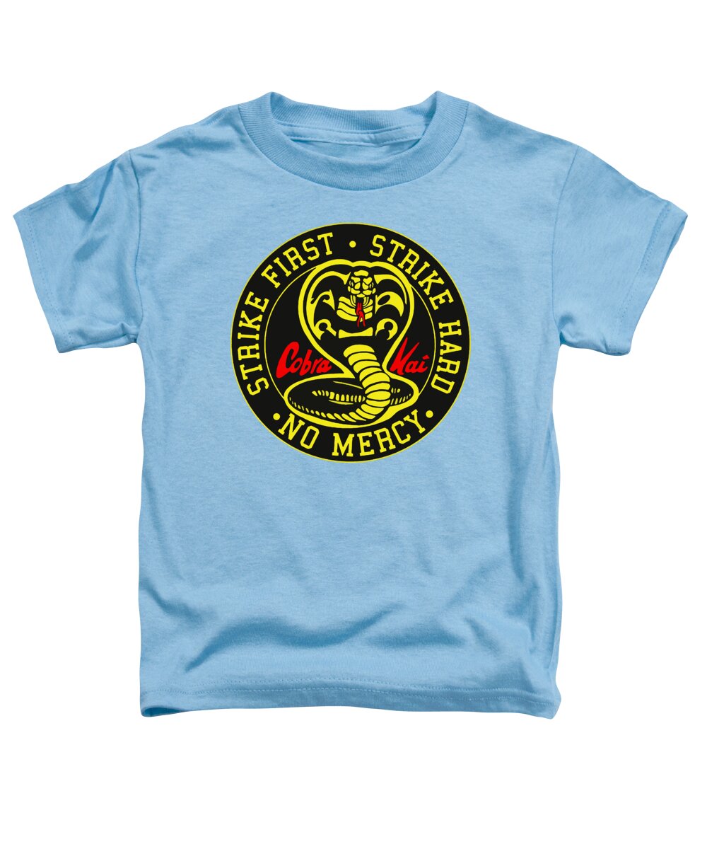 Toddler graphic t-shirt in light blue with Cobra Kai Strike First emblem at center