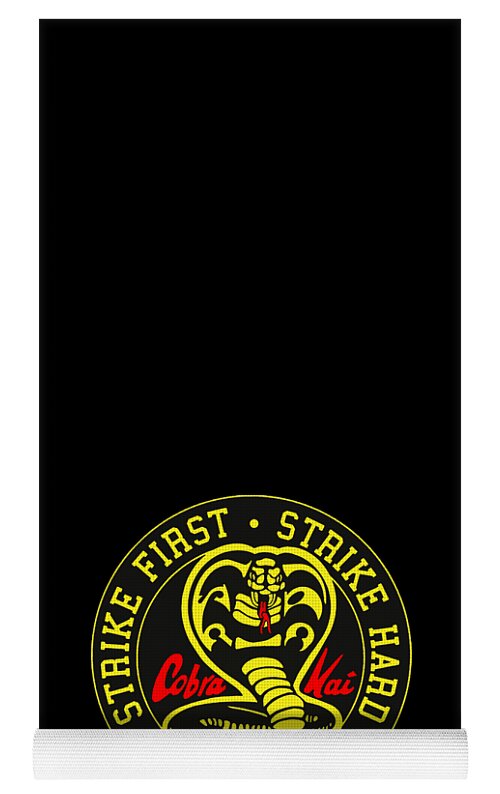 Black yoga mat with Cobra Kai circular logo and light gray edge strip