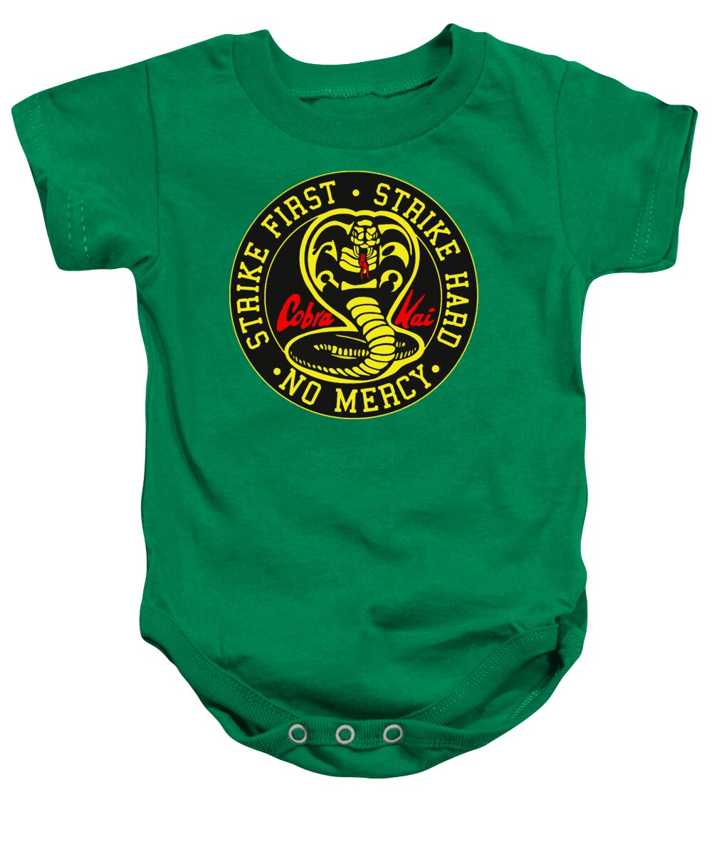 Kelly green baby onesie with short sleeves, snap-button legs, and round karate logo graphic