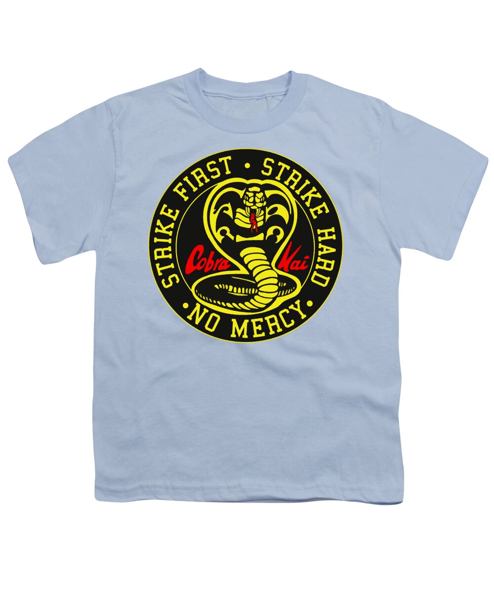 Light blue youth graphic T-shirt with Cobra Kai circular Strike First logo