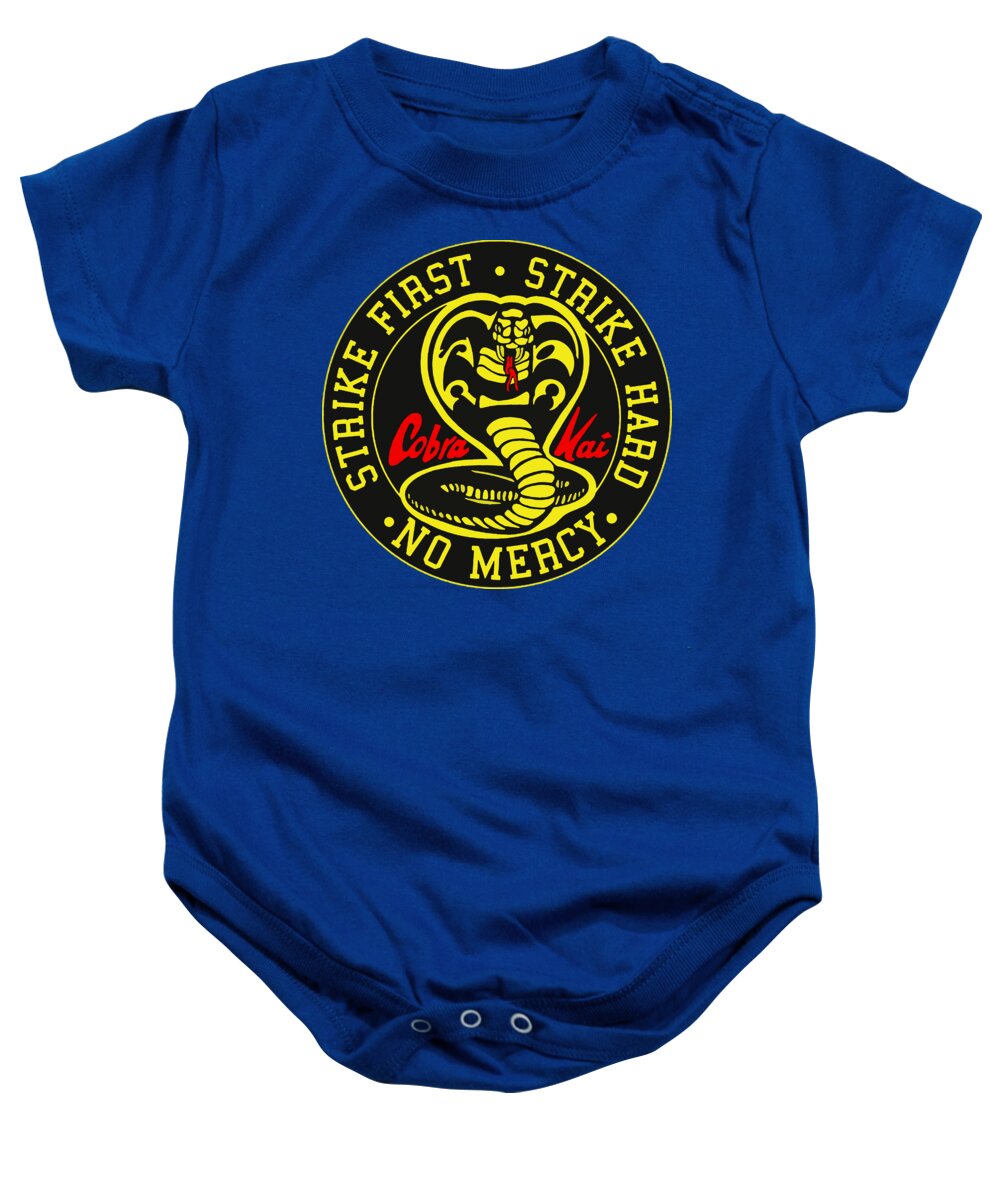 Royal blue baby onesie with circular cobra logo on chest