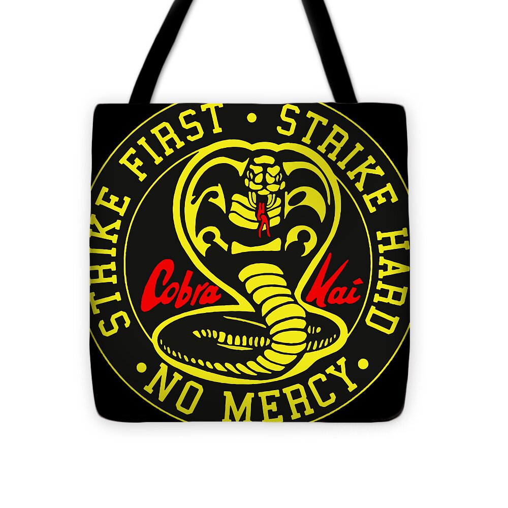 Black tote bag with full circular 'No Mercy' design, cobra face and 'Cobra' text; handles