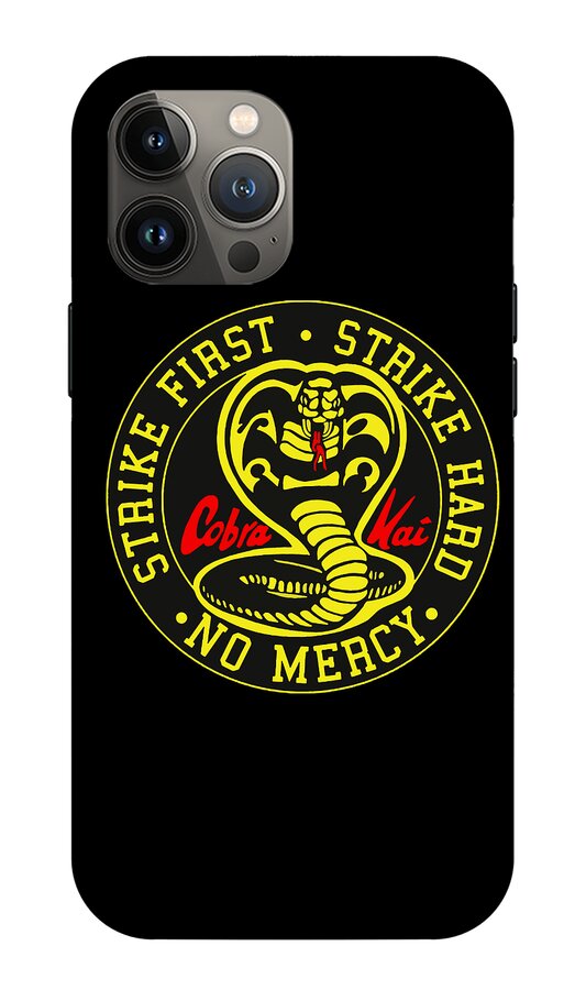 Black phone case with circular Cobra Kai logo and “Strike Hard, No Mercy” in red and yellow.