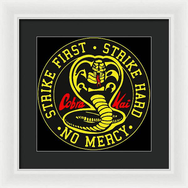 Framed Cobra Kai graphic wall art with dark frame and white inner mat, centered round logo design.