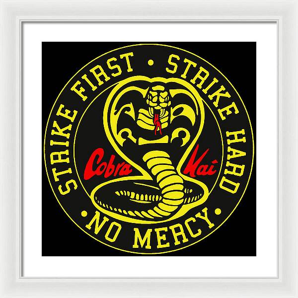 Framed wall print with white frame, circular Cobra Kai emblem on black background