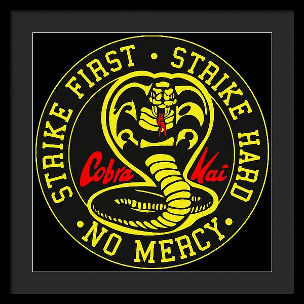 Framed wall print with black frame and dark mat, circular Cobra Kai emblem on black