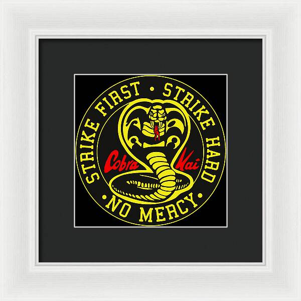Framed Cobra Kai graphic wall art with black inner mat and white frame, centered logo circle.