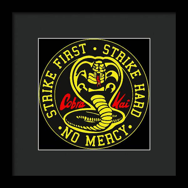 Dark gray framed print with circular Cobra Kai snake logo and “NO MERCY” text