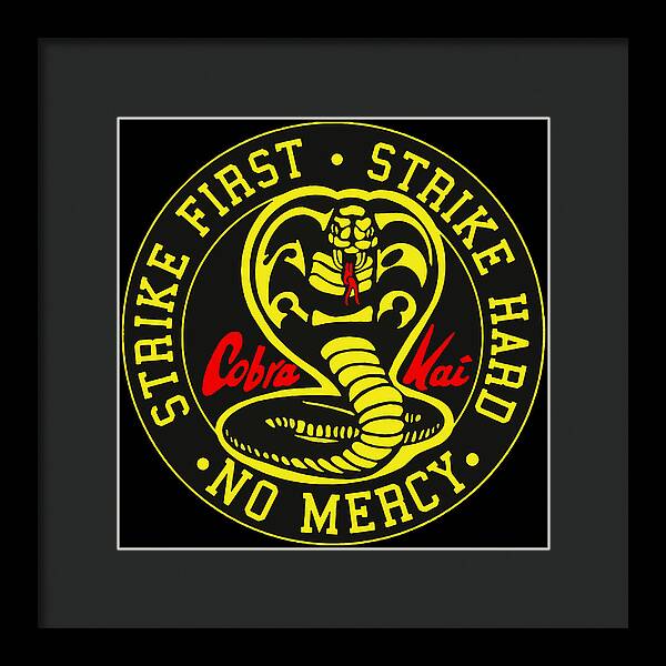 Framed Cobra Kai graphic wall art with dark frame and thin white border, centered logo circle.