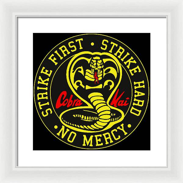 Framed wall print with white frame, circular Cobra Kai emblem on black background