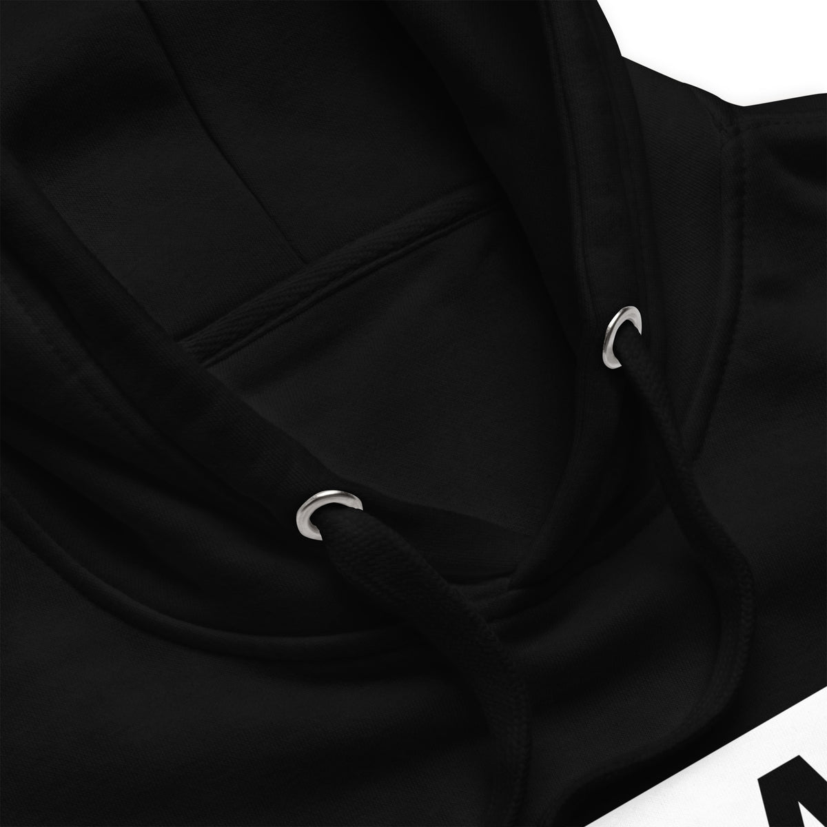 Black hoodie close-up: drawstrings with metal eyelets and kangaroo pocket seam