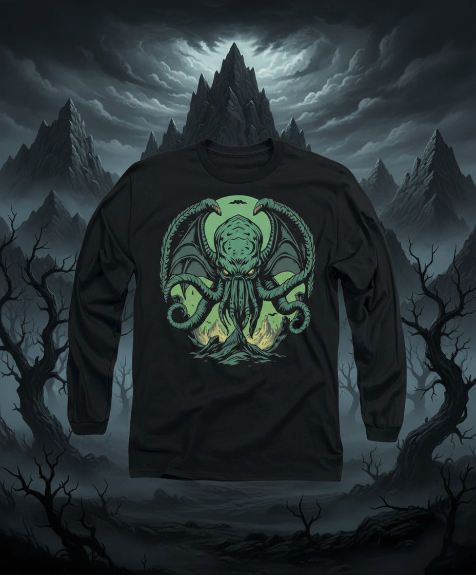 Black long sleeve T-shirt with neon green monster face graphic on chest