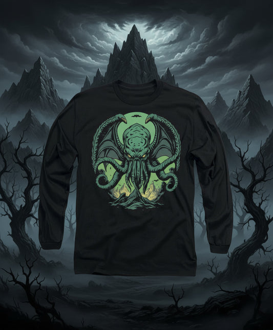 Black long sleeve T-shirt with neon green monster face graphic on chest