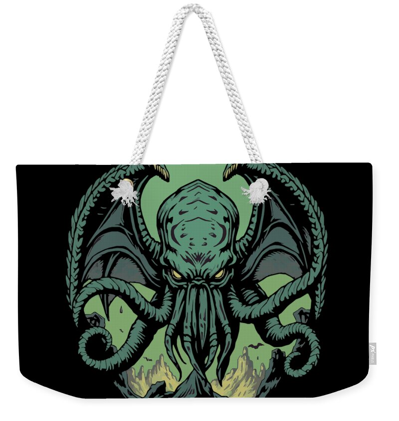 Weekender tote bag with black base, green tentacled demon print and white rope handles