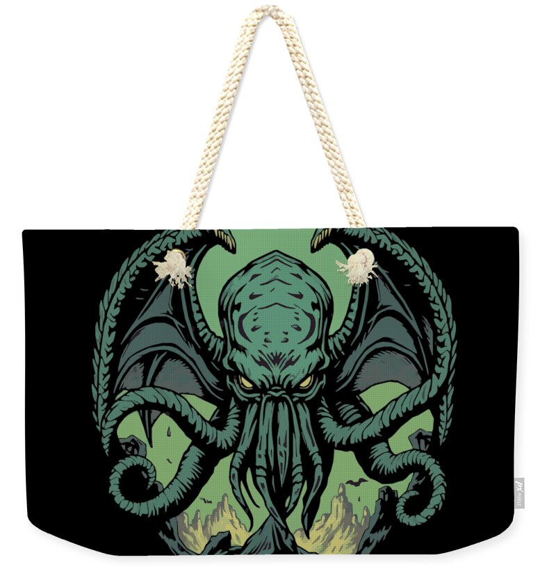 Weekender tote bag with black base, green tentacled demon print and natural rope handles