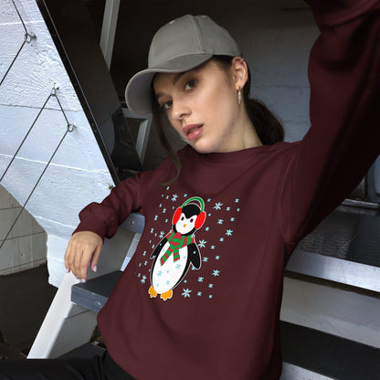 Maroon crewneck sweatshirt with long sleeves and a penguin graphic with snowflakes