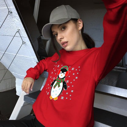 Red sweatshirt with long sleeves and a colorful penguin graphic with snowflake details.