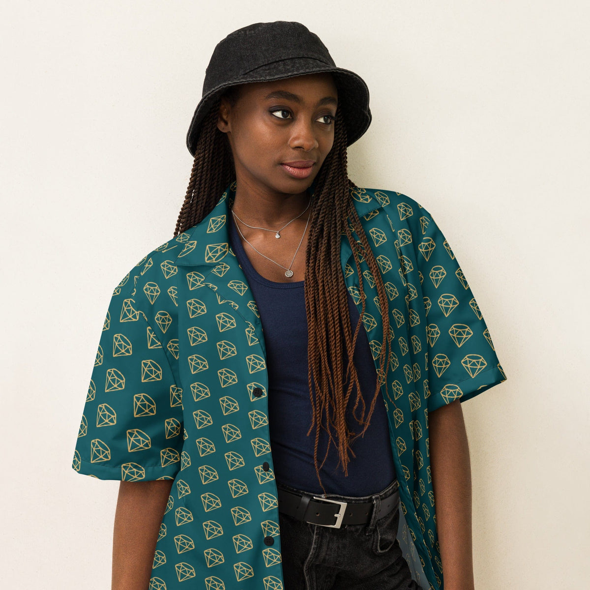 Unisex button-up shirt in dark teal with gold diamond print, short sleeves and front placket