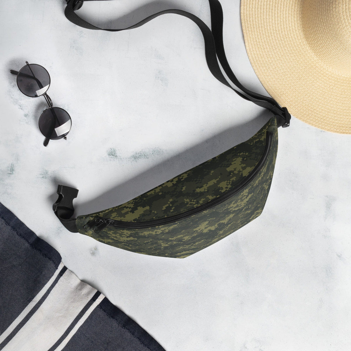 Camouflage fanny pack with black strap and side attachment clips