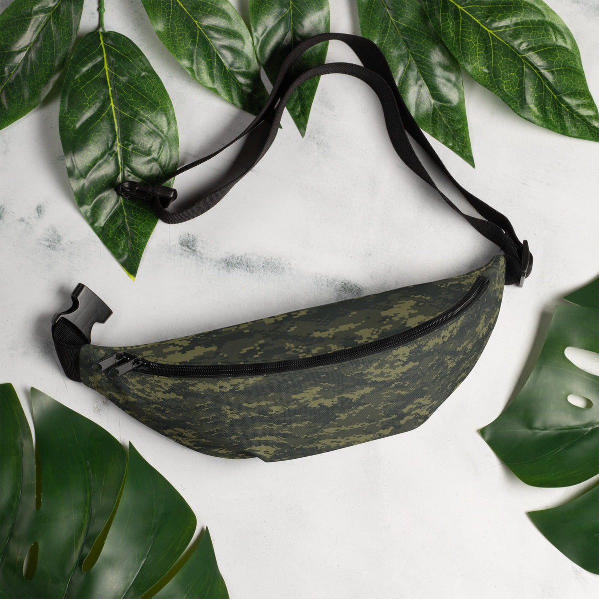 Camouflage fanny pack with black adjustable strap and front zip pocket