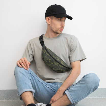 Camouflage waist bag worn diagonally across the body with black adjustable strap