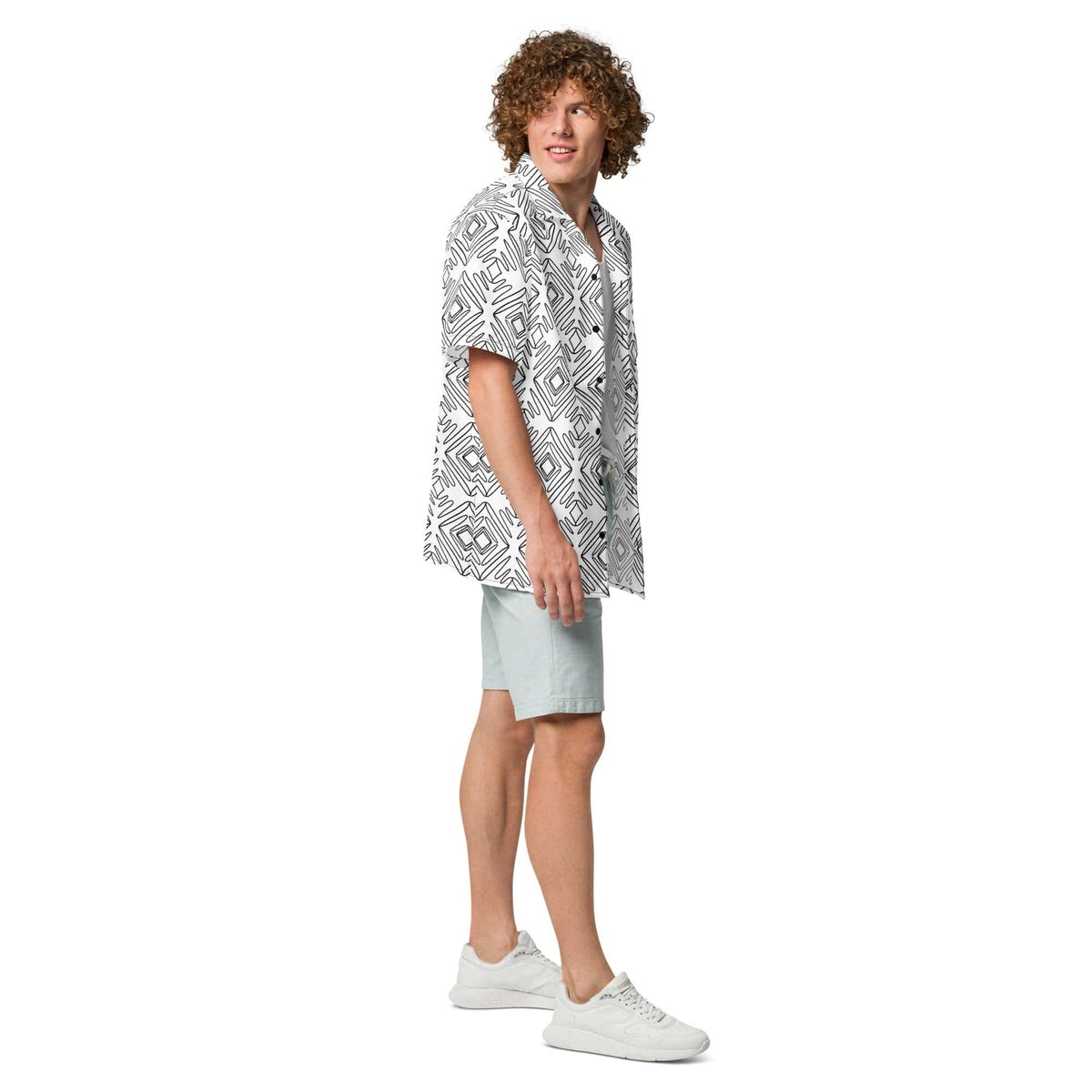 Unisex button-up shirt shown in profile, white with black doodle geometric print
