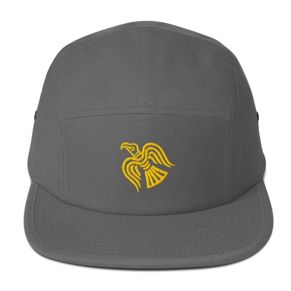 Grey five-panel cap with embroidered yellow raven emblem on the front