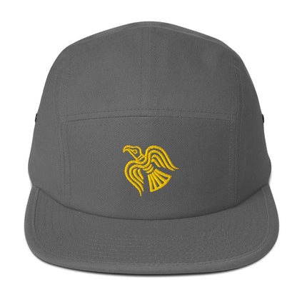 Grey five-panel cap with embroidered yellow raven emblem on the front