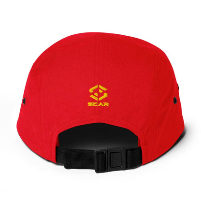 Red five-panel cap with embroidered yellow emblem at front and adjustable black strap