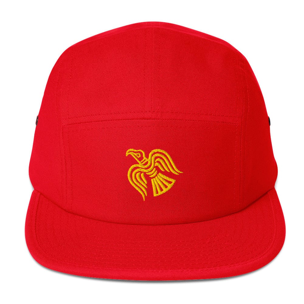 Red five-panel cap with embroidered yellow raven emblem on the front
