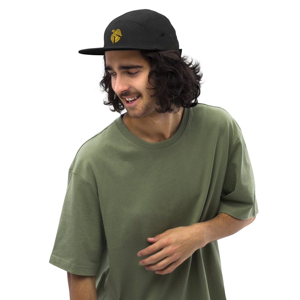 Black five-panel cap with yellow embroidered logo, worn with curved brim and low profile