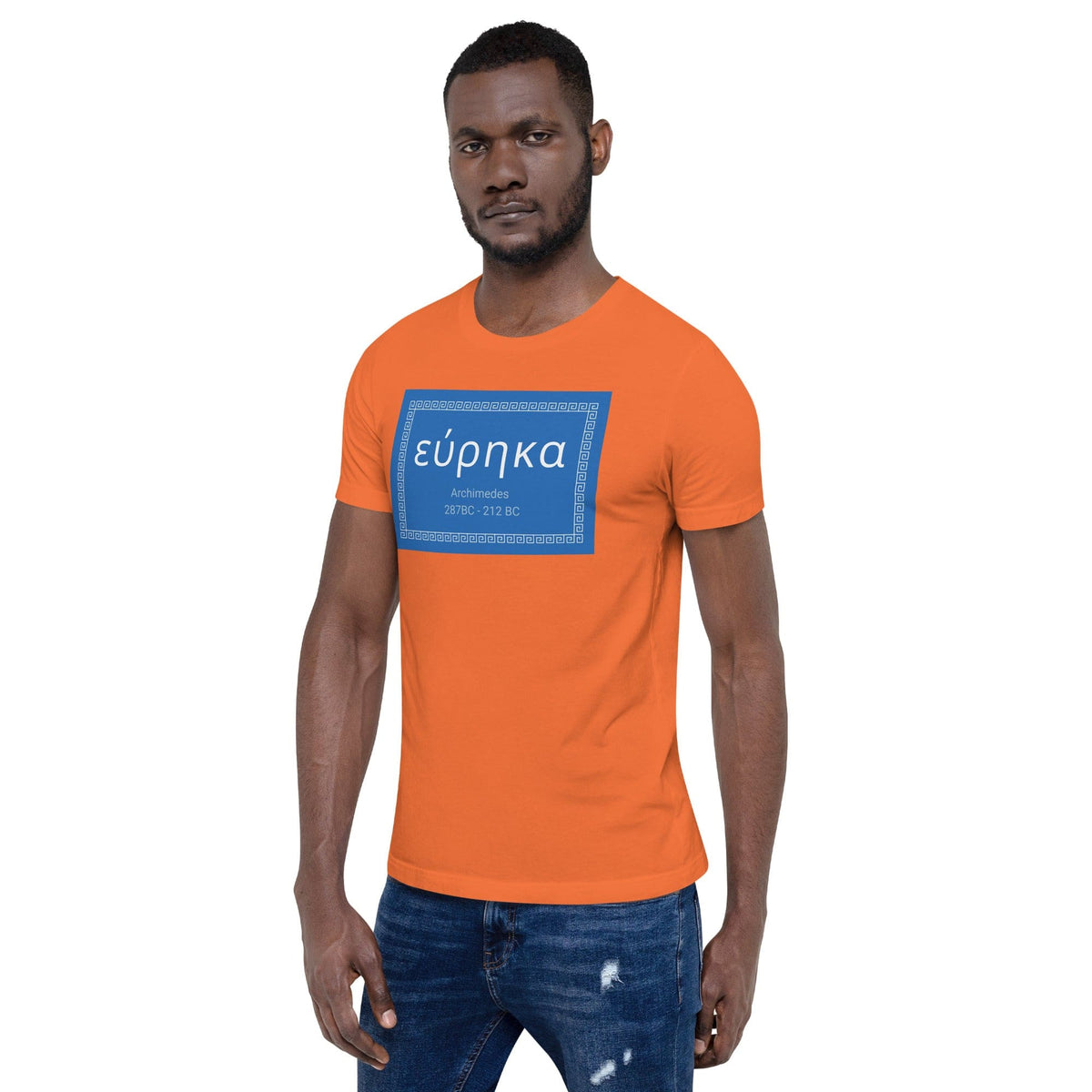 Orange crewneck T-shirt with blue “εύρηκα” quote graphic on front.