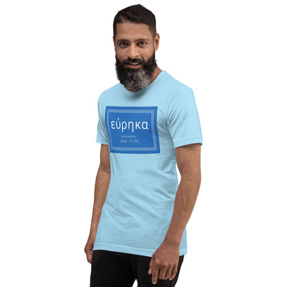 Light blue crewneck T-shirt with blue “εύρηκα” quote graphic on front.