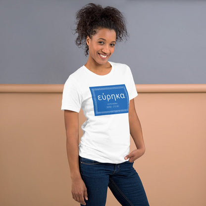 White crewneck T-shirt with blue “εύρηκα” quote graphic on front.
